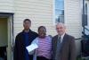 GBAR President Steve Day presents REALTOR Relief Fund Checks to Binghamton residents affected by the Flood.